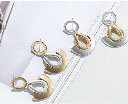 Contemporary Teardrop Earring Accented with Arc at the Base