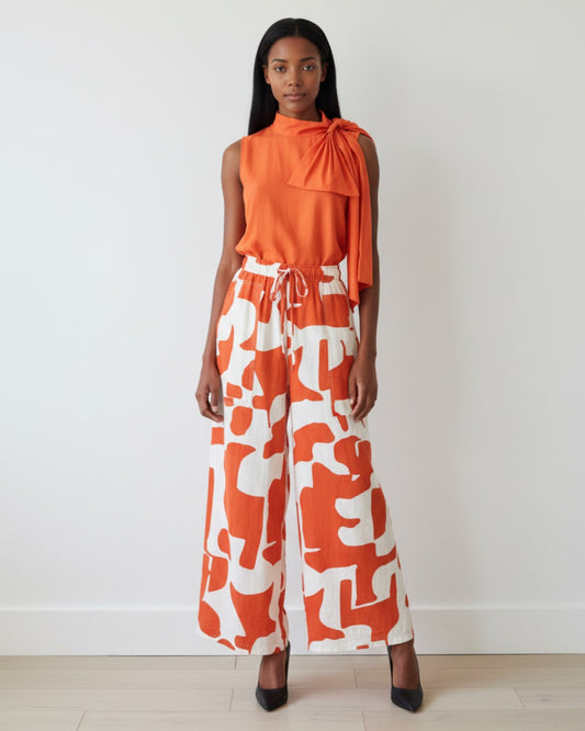 Vibrant Sunset Orange and Cream Swirl Print Wide Leg Pants